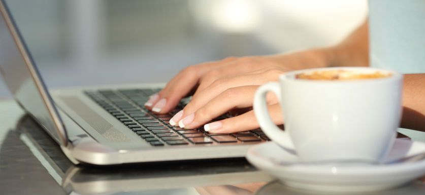 typing on a computer for EITC notice or IRS notice 797