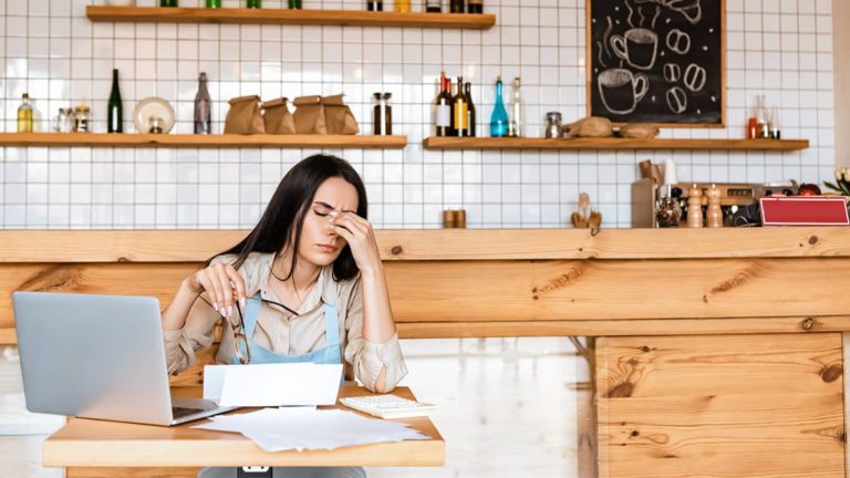 woman stressed out about making business tax return mistakes